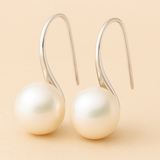 Elegante Tropfenohrringe mit Perlen