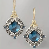 Blaue Kristallohrringe in Gold und Silber