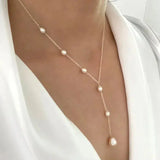 Vintage-Pendelkette mit Perlen